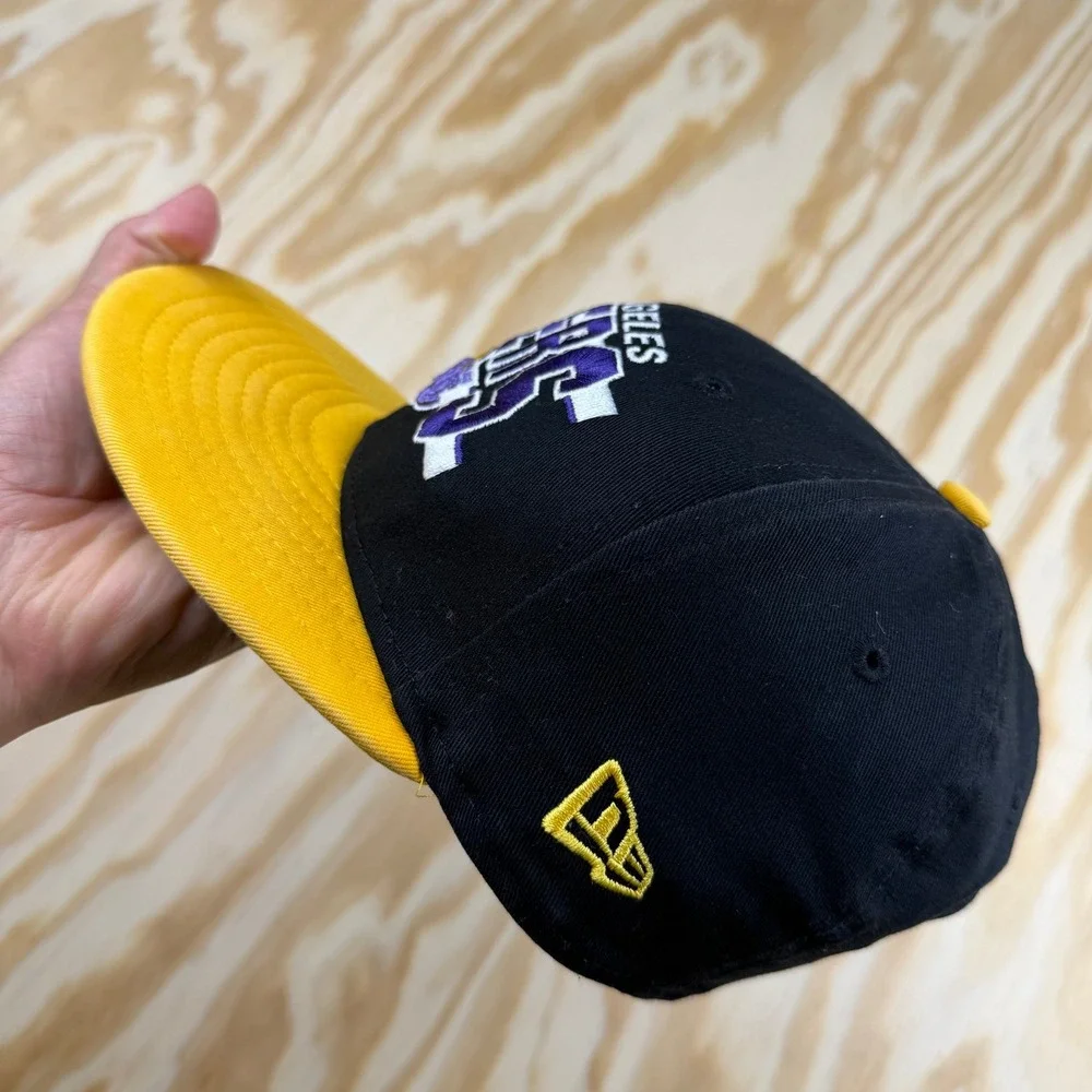 New Era 9FIFTY Los Angeles Lakers Youth Snapback‎ Hat Black Yellow NBA HWC Cap